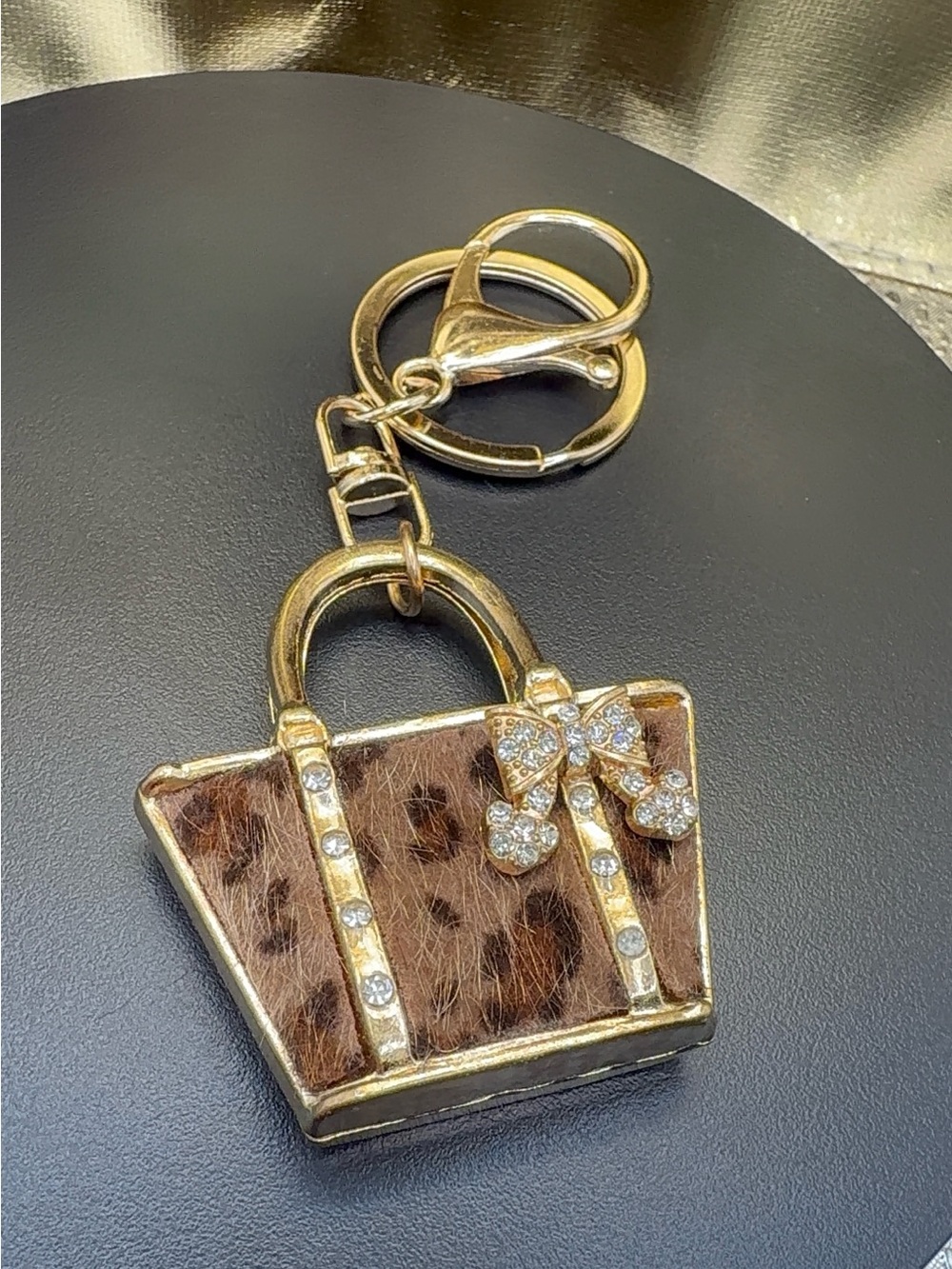 Gold-Tone Leopard Print Handbag Keychain with Crystal Bow